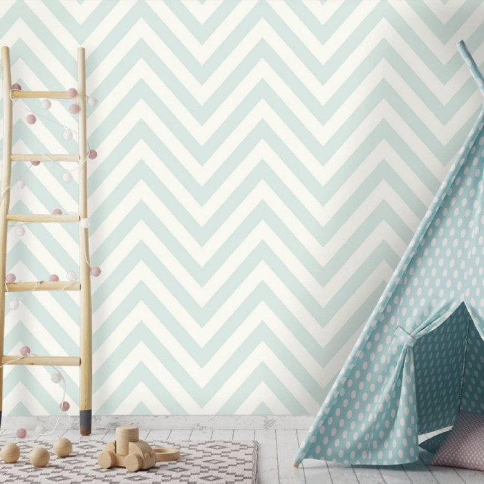 blue and white chevron wallpaper in child's bedroom