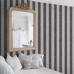 black and white striped wallpaper in bedroom