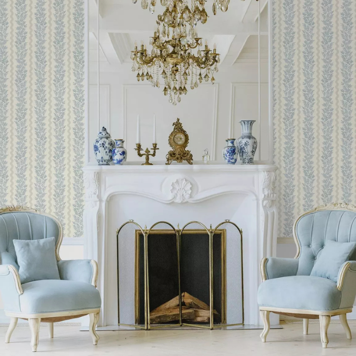 Foliage striped wallpaper in powder wedgewood blue. French styled sitting room.